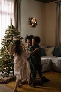 A Family Decorating the Christmas Tree